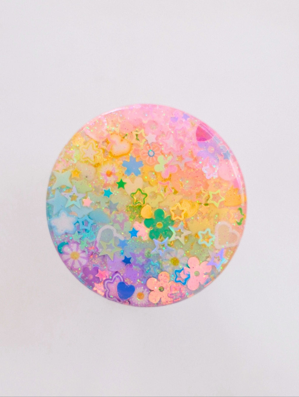 pastel rainbow monochromatic phone grip on a white background