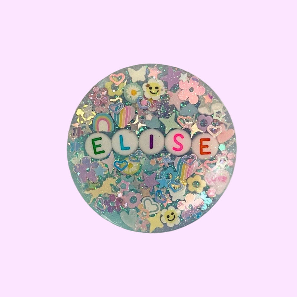 phone grip with purple and blue resin glitter unicorns and rainbows