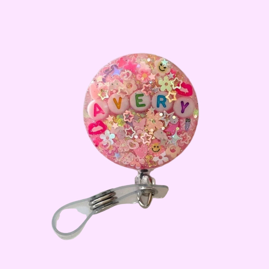 Pink badge reel with glitter