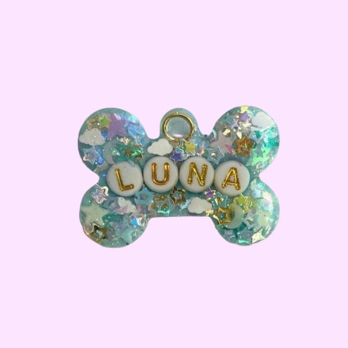 glittery soft blue bone shaped pet tag